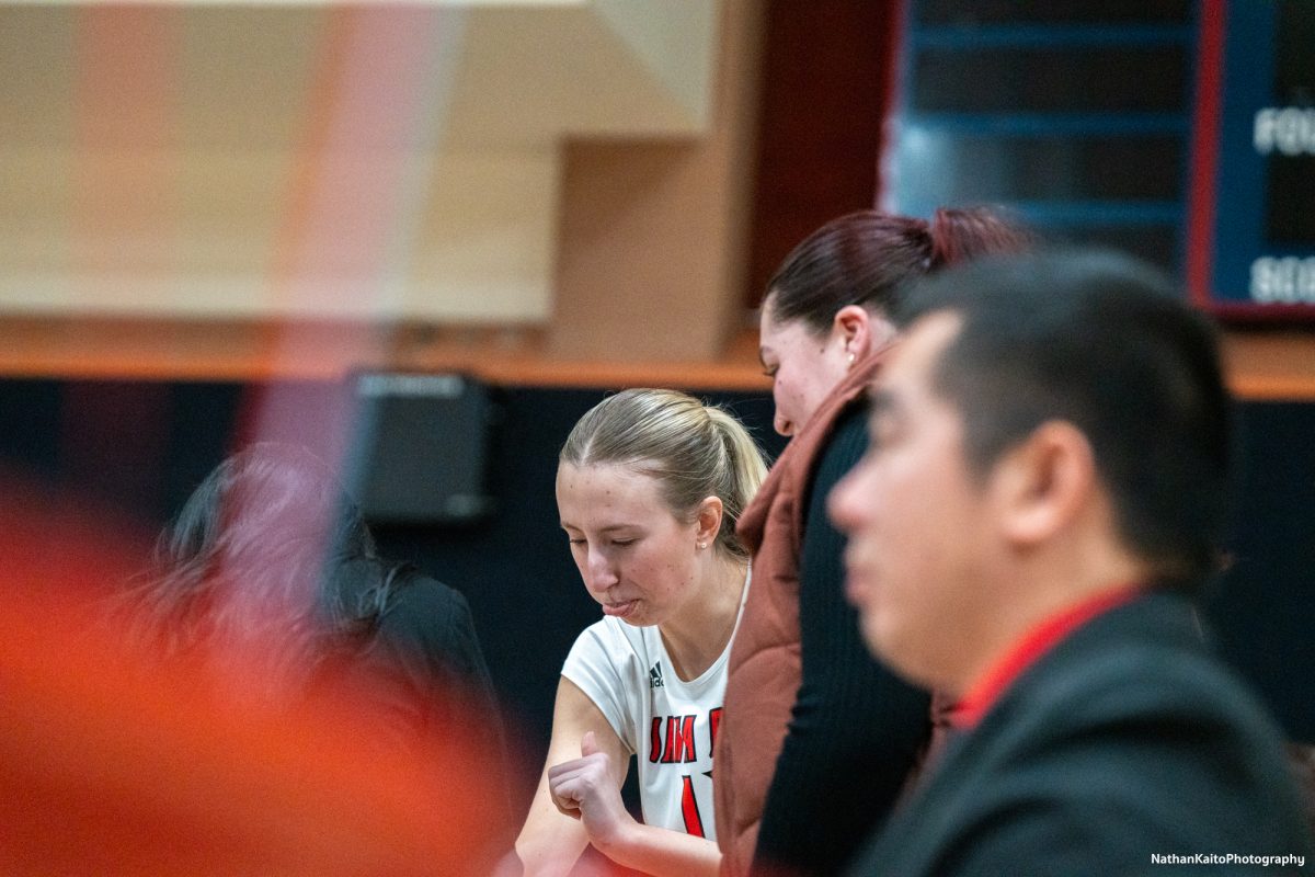 Santa Rosa’s middle/opposite Kiana Walker sticks her tongue out and celebrates after exiting the court against San Joaquin Delta at Haehl Pavilion on Friday, Nov. 15, 2024.