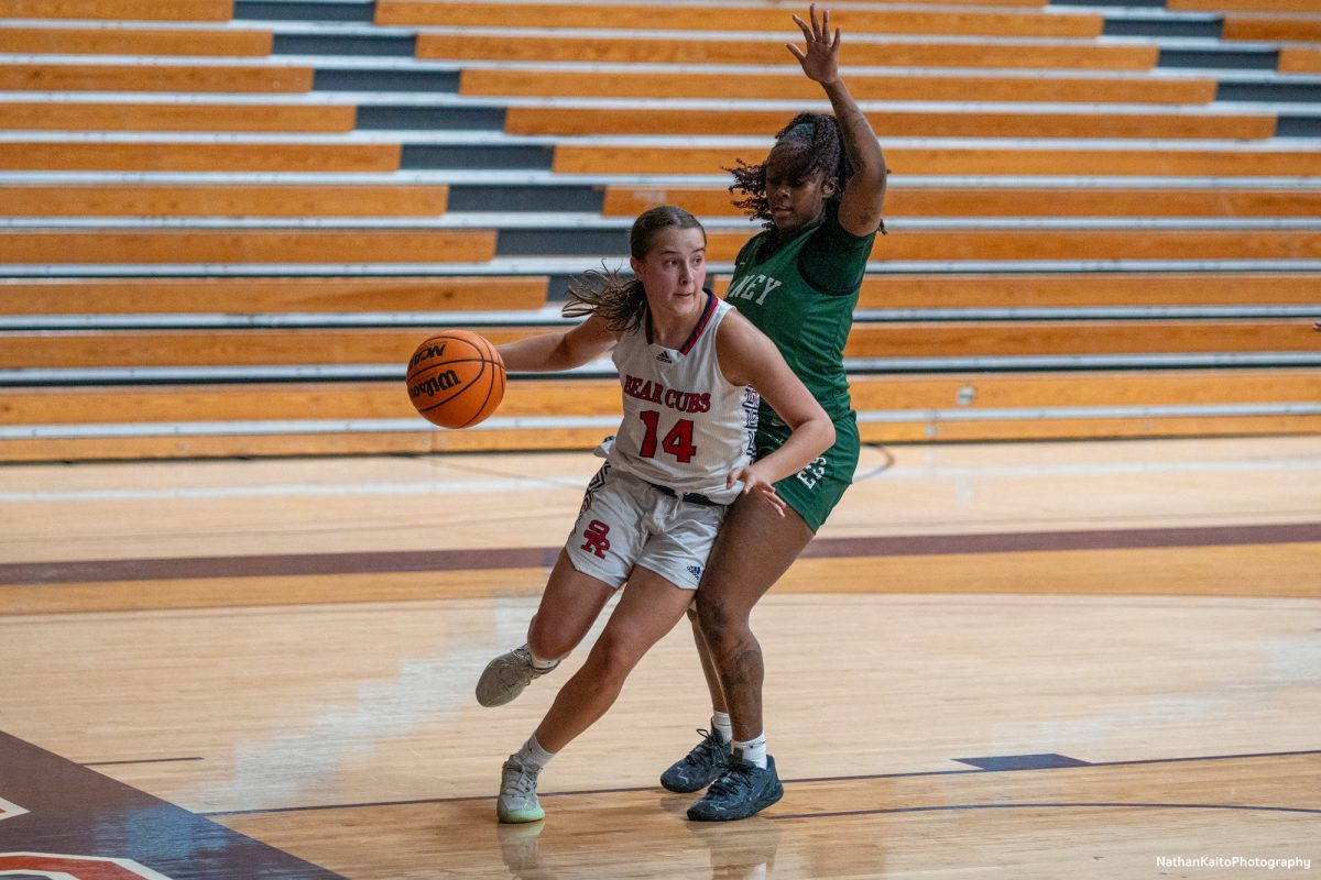 Santa Rosa’s forward Kaia Eubanks looks for a pass after surging into the paint against Laney at Haehl Pavilion on Friday, Nov. 22, 2024. 