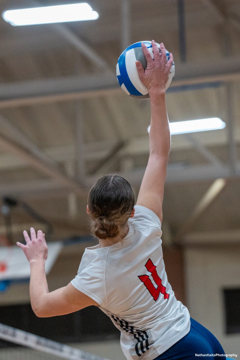 Santa Rosa’s outside hitter Madison Shaw jumps up and connects with the ball for a spike against San Joaquin Delta at Haehl Pavilion on Friday, Nov. 15, 2024.