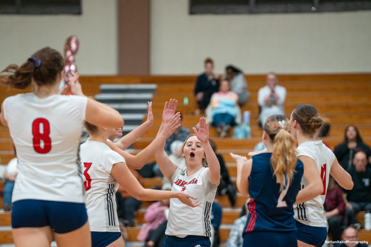 The Bear Cubs run towards setter, Sierra Yates-Bruch to embrace and celebrate against San Joaquin Delta at Haehl Pavilion on Friday, Nov. 15, 2024.