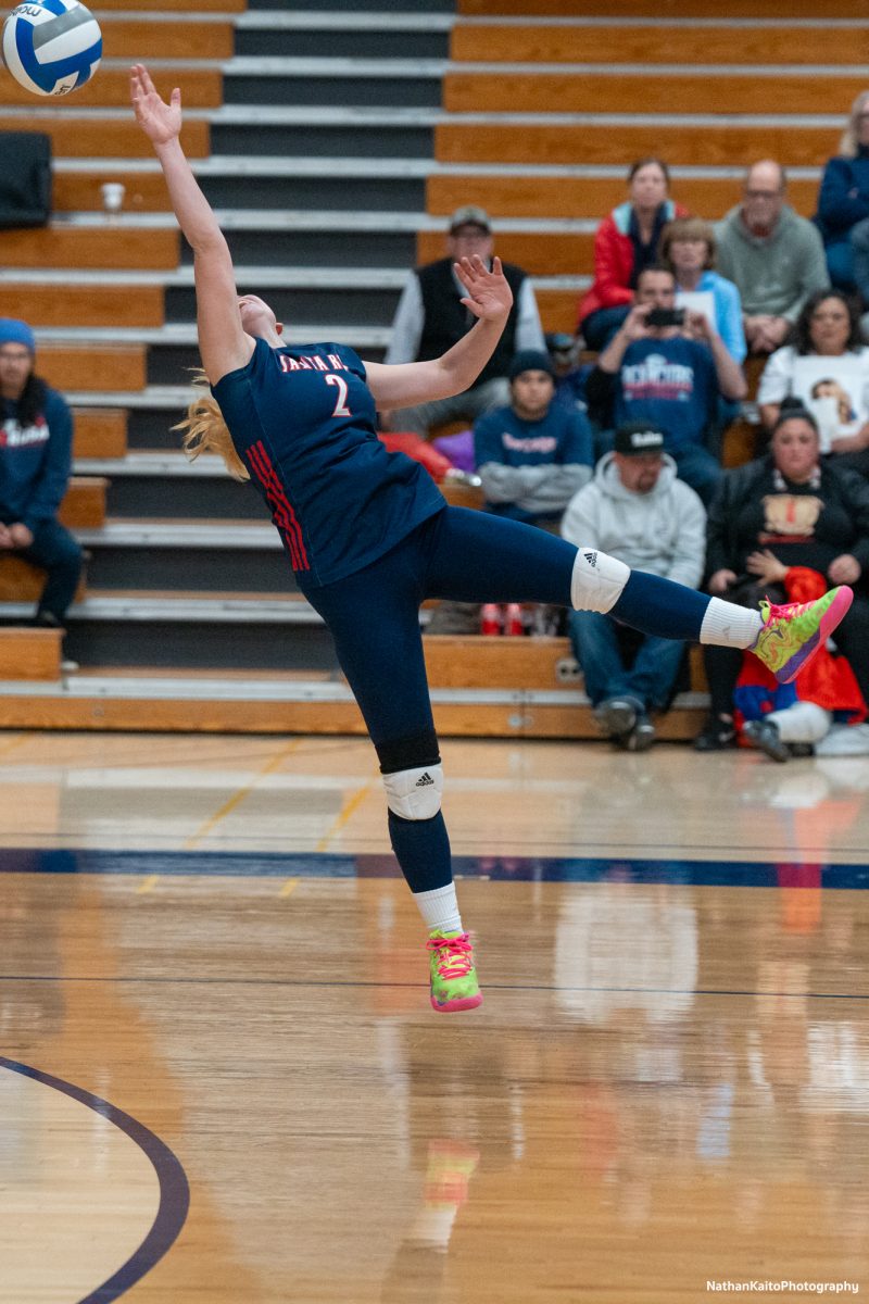 Bear Cubs’ defensive specialist Jaiden Brooner acrobatically reaches for the ball against San Joaquin Delta at Haehl Pavilion on Friday, Nov. 15, 2024.