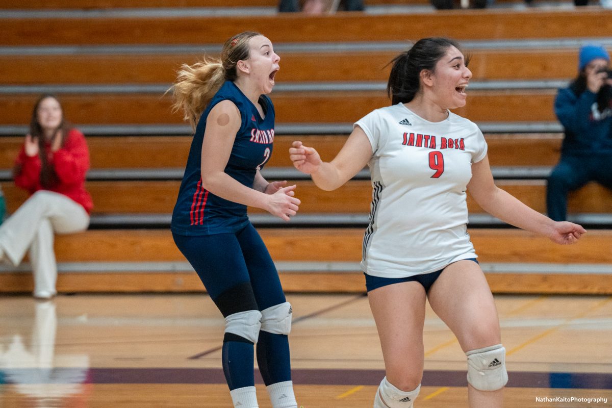 Santa Rosa’s Stephanie Melendez celebrates Jaiden Brooner’s free ball kill against San Joaquin Delta at Haehl Pavilion on Friday, Nov. 15, 2024.