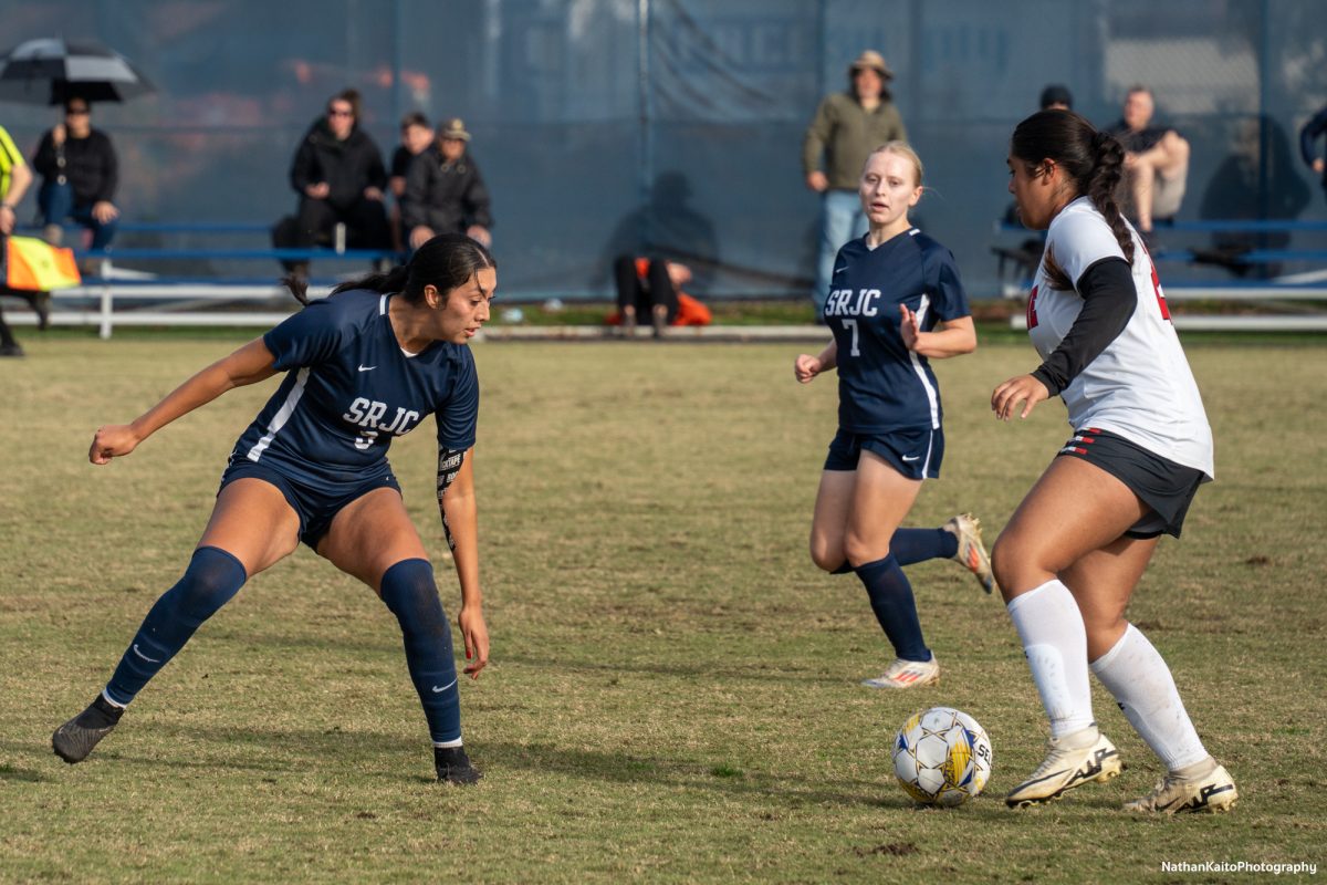 Bear Cubs’ defender Jocelyn Rojas-Garfias sizes up the opposition attacker against Skyline College at home on Nov. 23, 2024