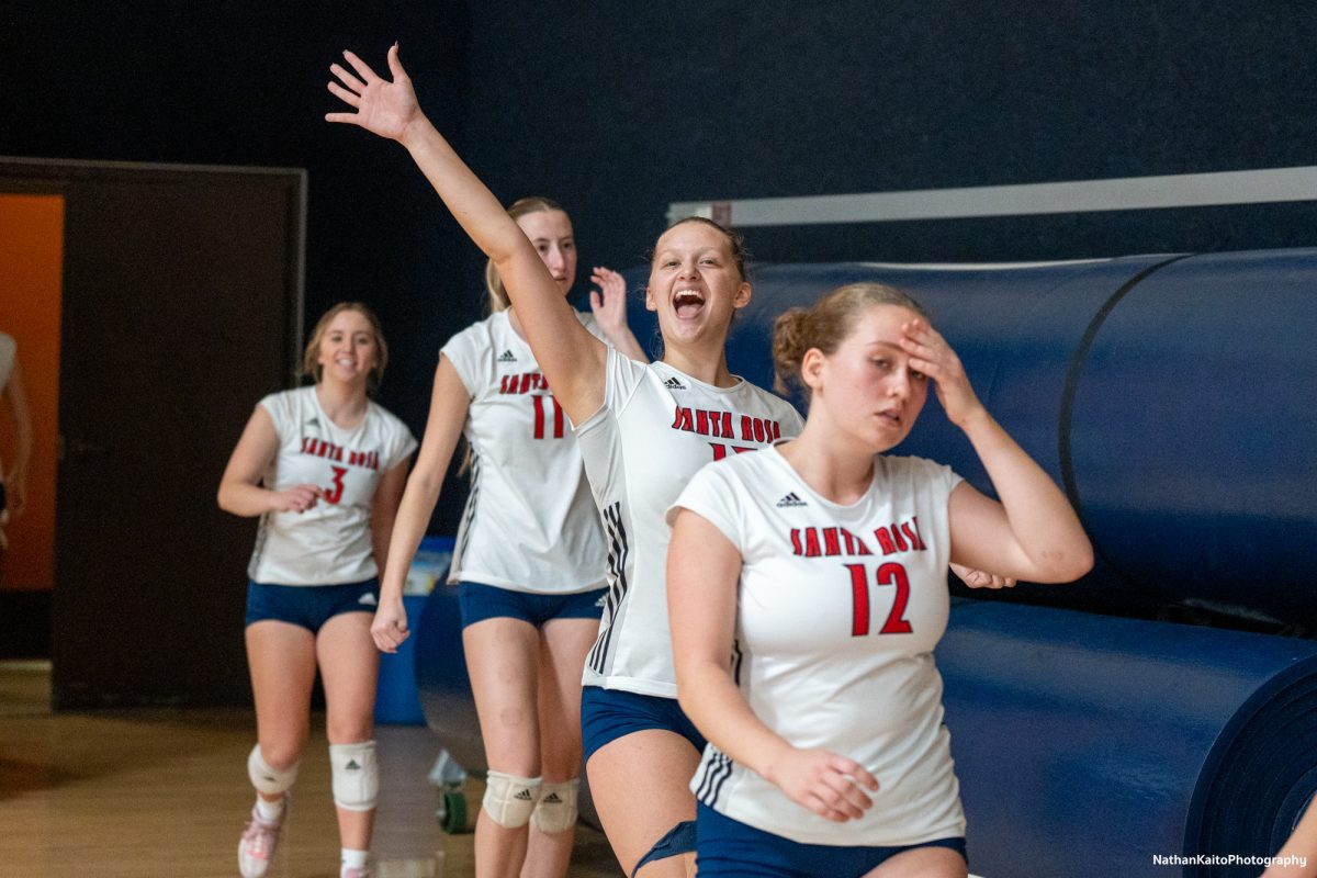 Bear Cubs’ middle blocker Sarah Thornton in high spirits as she walks onto the court at Haehl Pavilion before their game against San Joaquin Delta on Friday, Nov. 15, 2024.