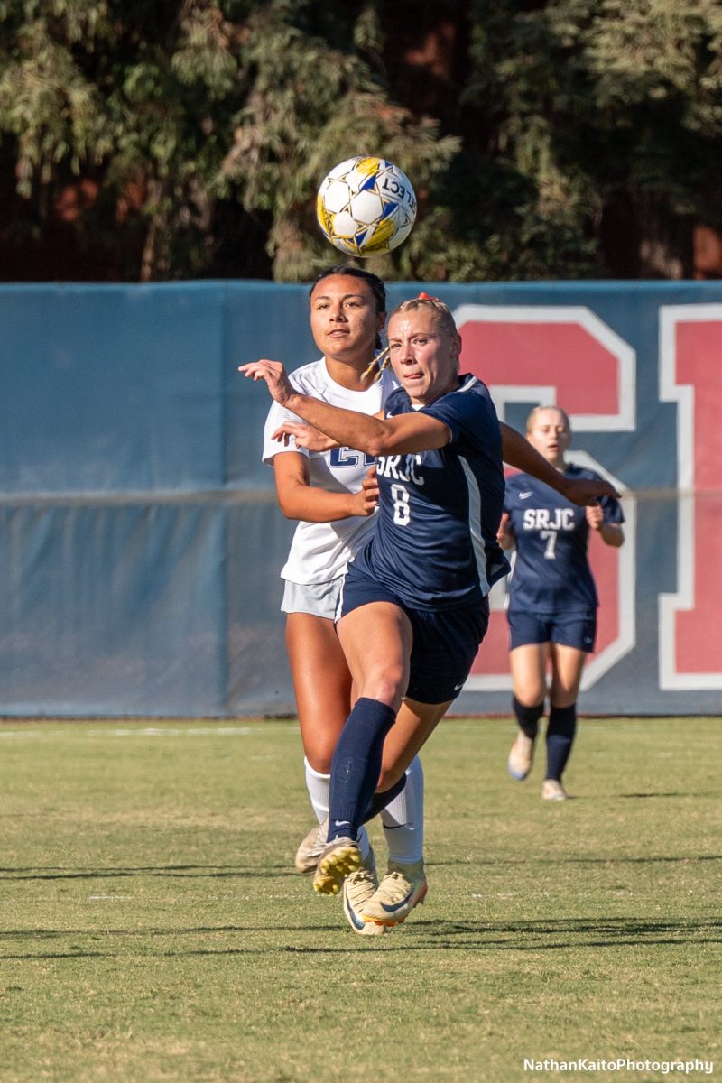 Bear Cubs’ forward Taylor Gandy gets in front of her defender from Cosumnes River as they race for the ball at home on Tuesday, Oct. 29, 2024.