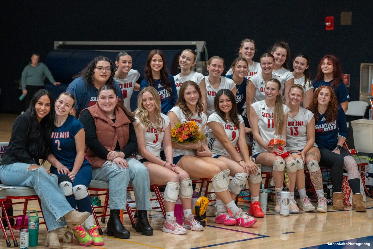 Santa Rosa Junior College’s Women’s Volleyball team poses in celebration of their sophomores before their game against San Joaquin Delta on Friday, Nov. 15, 2024.