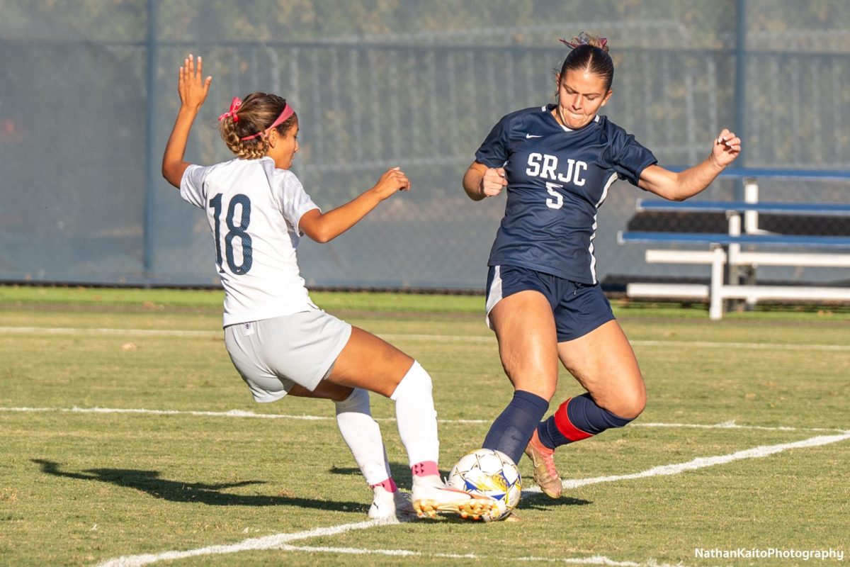 Bear Cubs’ forward Genevieve Stewart and Cosumnes River midfielder Isabella Ramos clash for the ball at home on Tuesday, Oct. 29, 2024.