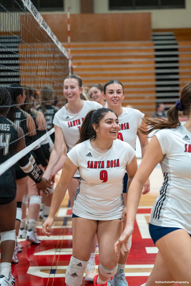 Bear Cubs’ outside hitter Stephanie Melendez shakes hands with the opposing team before their game against San Joaquin Delta on Friday, Nov. 15, 2024.