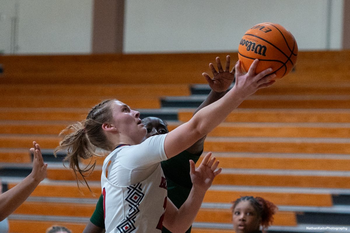 Santa Rosa’s forward Sydney Martin surges up towards the net for a layup against Laney at Haehl Pavilion on Friday, Nov. 22, 2024. 