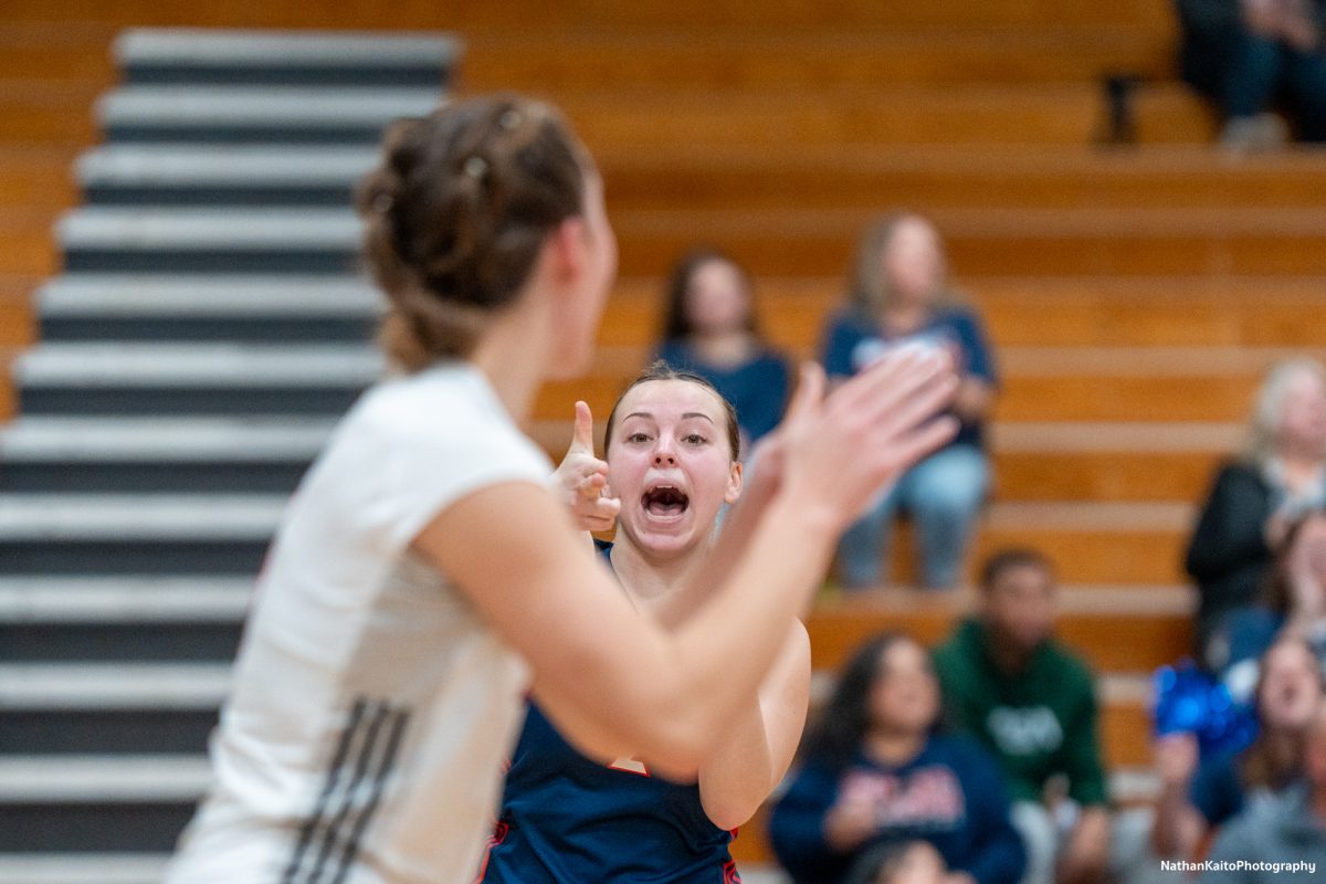 Bear Cubs’ defensive specialist Jaiden Brooner points gunfingers at outside hitter Madison Shaw to celebrate a point against the College of the Sequoias at Haehl Pavilion on Nov. 23rd, 2024. 