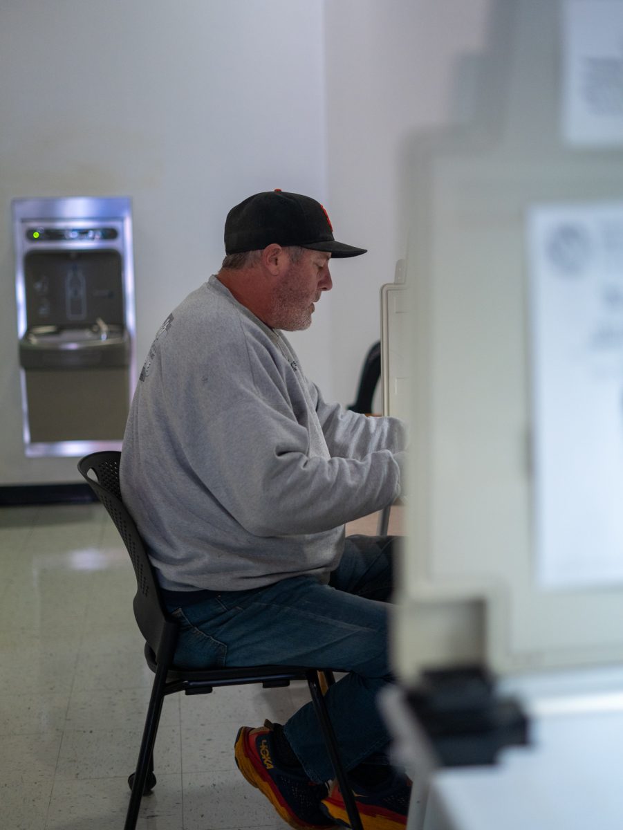 A voter confirms his choices at the Registrar of Voters in Santa Rosa on Nov. 5th, 2024. 