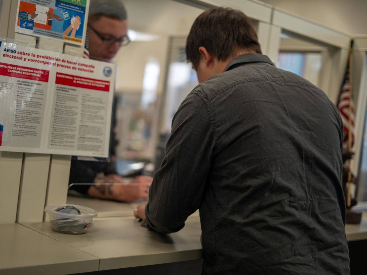 Oak Leaf Reporter Nathan Kaito Morris signs in to cast his vote at the Registrar of Voters in Santa Rosa on Nov. 5th, 2024. 