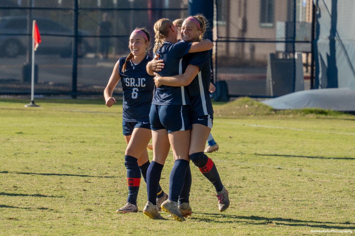 Bear Cub's Olivia Hohnstein, left, Taylor Gandy, center, and Shae Dougherty, right, celebrate their first goal against Modesto at home on Friday, Nov. 8th, 2024