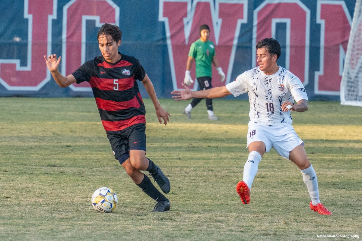 Bear Cubs’ defender Adrian Valencia skips past Cosumnes River’s Joaquin Luna at home against Cosumnes River on Tuesday, Nov. 12, 2024. 