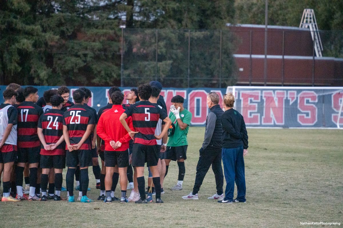 The Bear Cubs’ head coach Marty Kinahan speaks to his frustrated players after securing a draw at home against Cosumnes River on Tuesday, Nov. 12, 2024. 