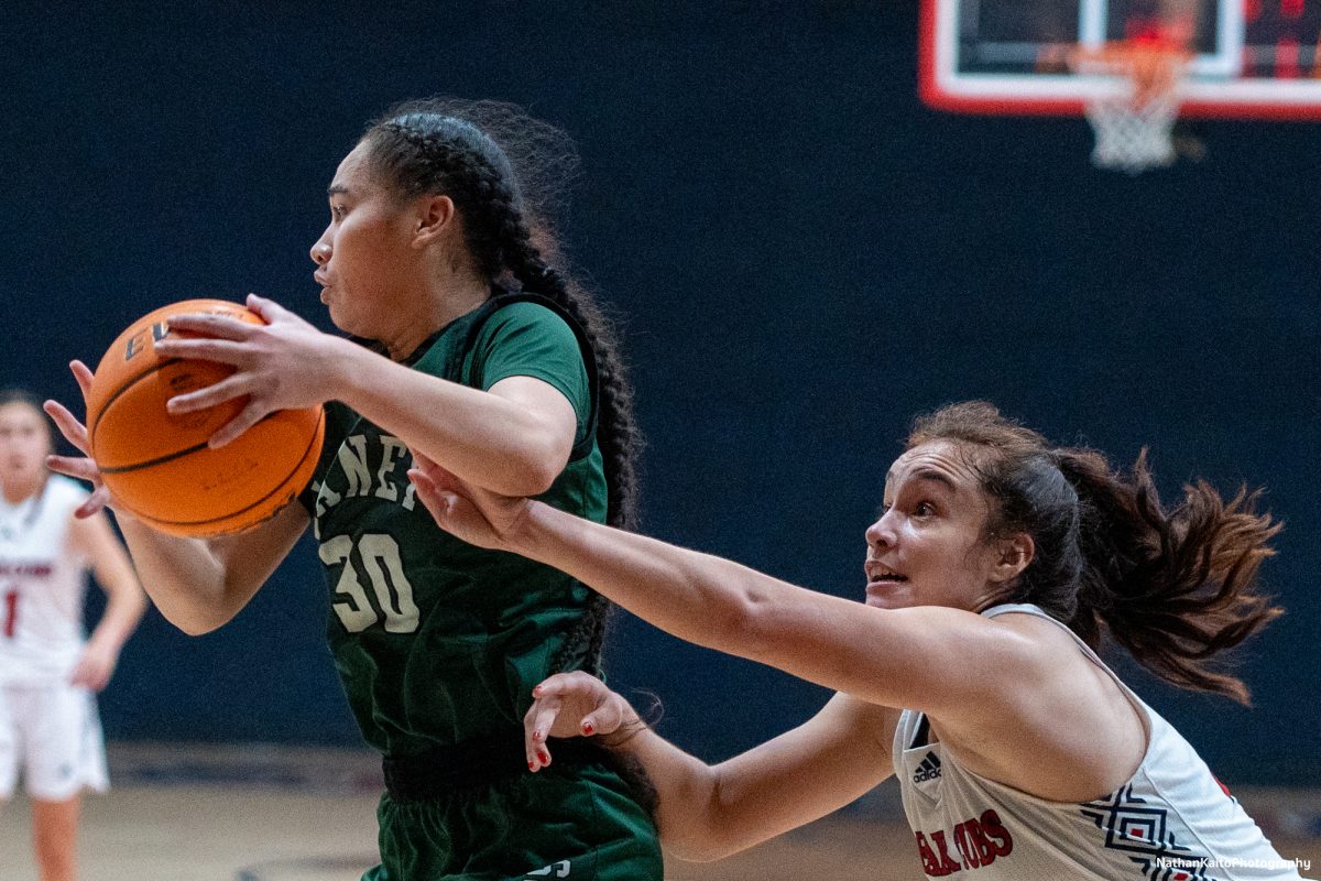 Bear Cubs’ guard/forward Ivy Gonzalez reaches for the ball after missing a rebound against Laney at Haehl Pavilion on Friday, Nov. 22, 2024. 