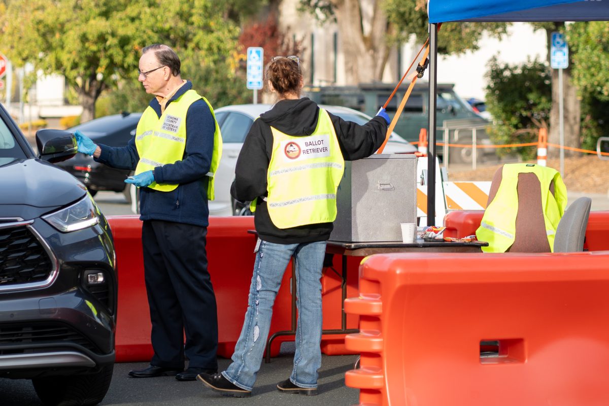 Ballot retrievers collect votes during the November Presidential Election at the Registrar of Voters in Santa Rosa on Tuesday, Nov. 5th, 2024. 