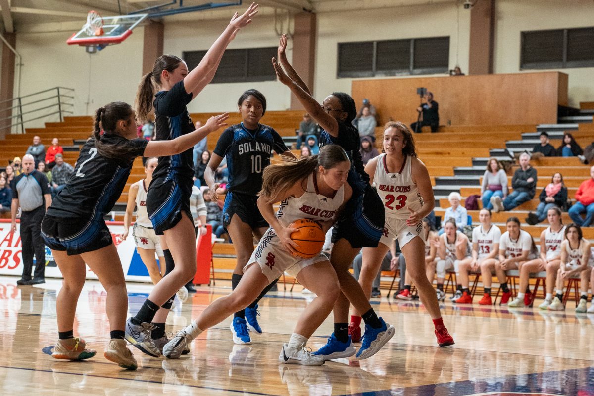 Bear Cubs guard Shasta Vlasak is surrounded by Solano defense as she looks for an open teammate at Haehl Pavilion on Tuesday Nov. 26, 2024.