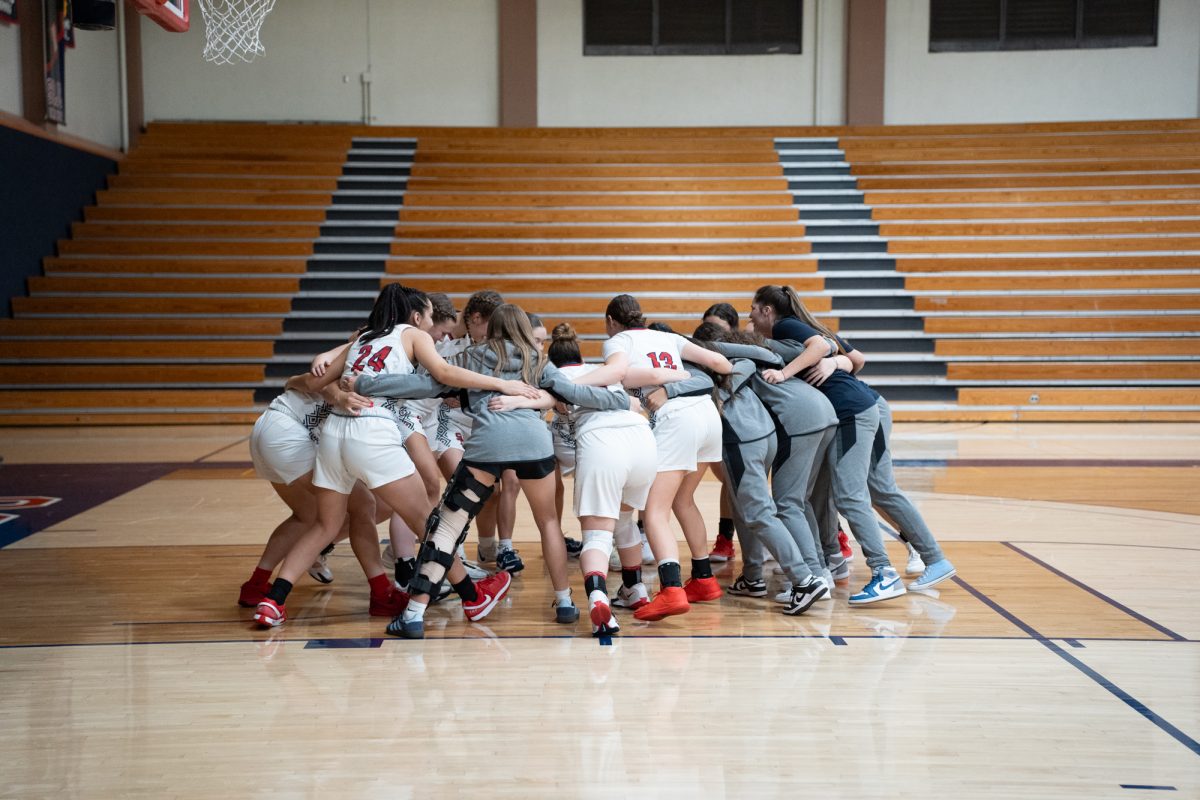 The SRJC Bear Cubs huddle up before the start of the match ahead of the game against Solano at Haehl Pavilion on Tuesday Nov. 26, 2024.