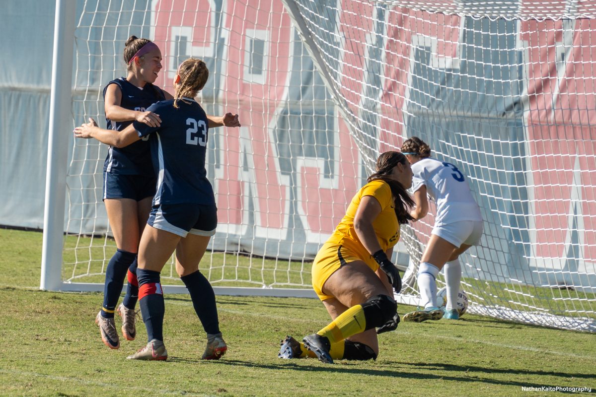 The Bear Cubs' Olivia Hohnstein and Shae Dougherty celebrates the opening goal as the ball gets picked out the back of the net against Modesto at home on Friday, Nov. 8th, 2024