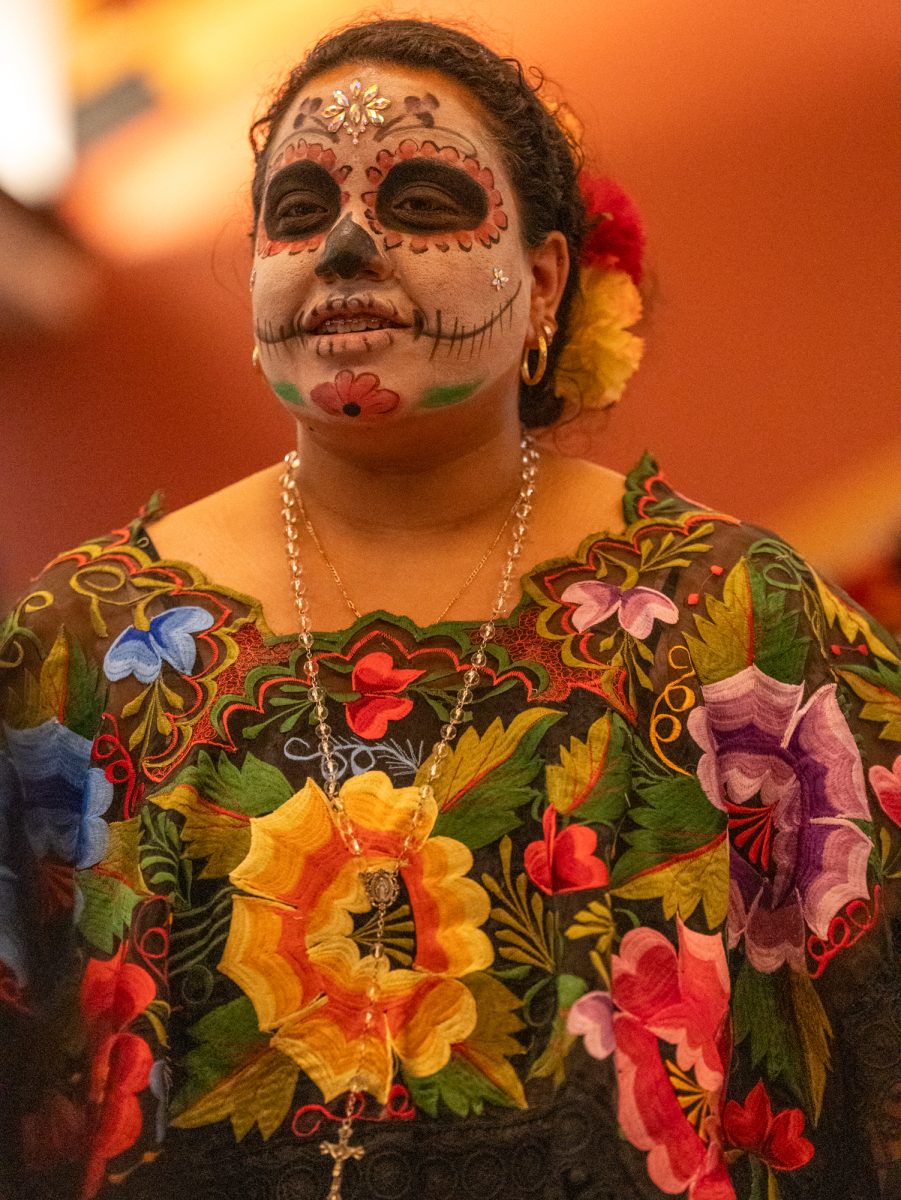 Attendees participated in a Catrin/Catrina contest held during the Dia De Muertos celebration at the Bertolini Student Center on Wednesday, Oct. 23, 2024.