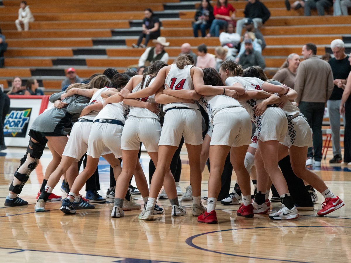 The SRJC women's basketball team huddle up ahead of their game in the Santa Rosa Crossover tournament at home in Haehl Pavilion against City College of San Francisco on Sunday, Nov. 17, 2024.