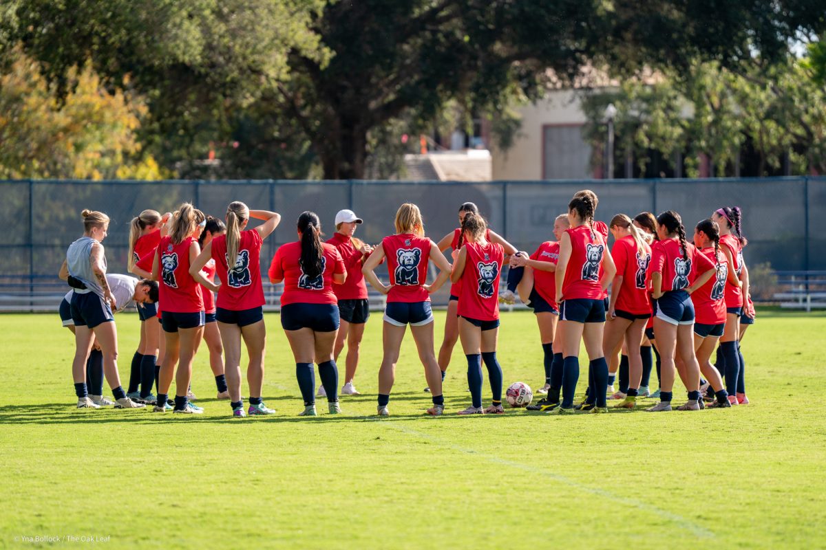 Head coach Crystal Chaidez meets with the women's soccer team ahead of their annual alumni game on Sunday, Oct. 6, 2024.