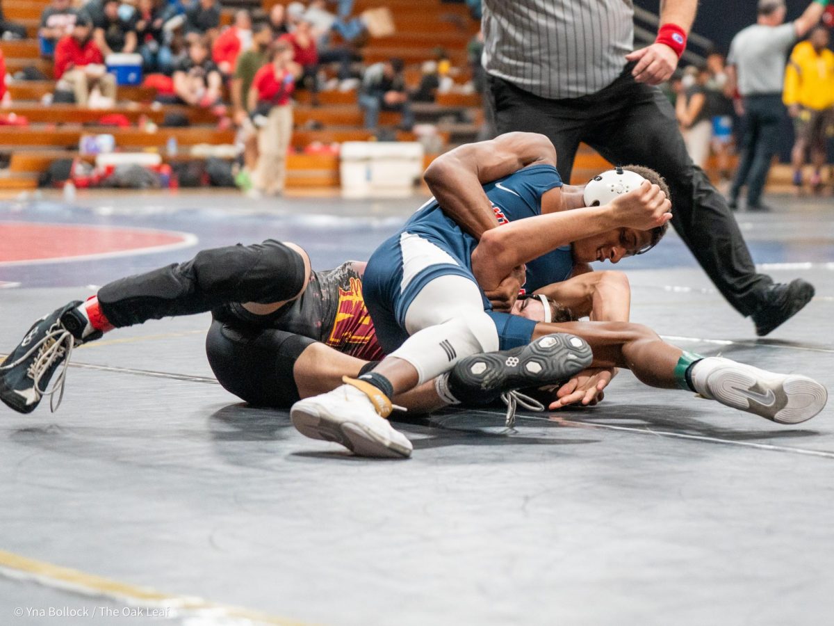 Bear Cub Derek Ruffin (125) locks in on College of the Redwood's Dakota Sanders in thew quarterfinals of the CCCAA Norcal Regional Championships in Haehl Pavilion on Saturday, Dec. 7. Ruffin beats Sanders by decision, 10-9.