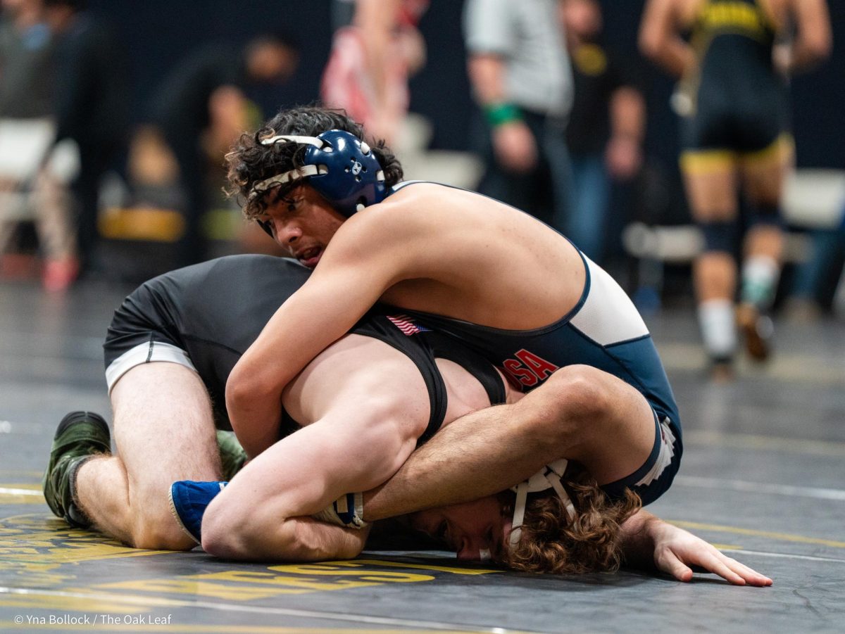 SRJC's Vicente Rodarte (149) tightens his grip on Sierra's Brock Birkett in the quarterfinals of the CCCAA Norcal Regional Championships in Haehl Pavilion on Saturday, Dec. 7. Roadarte wins by major decision, 12-0.