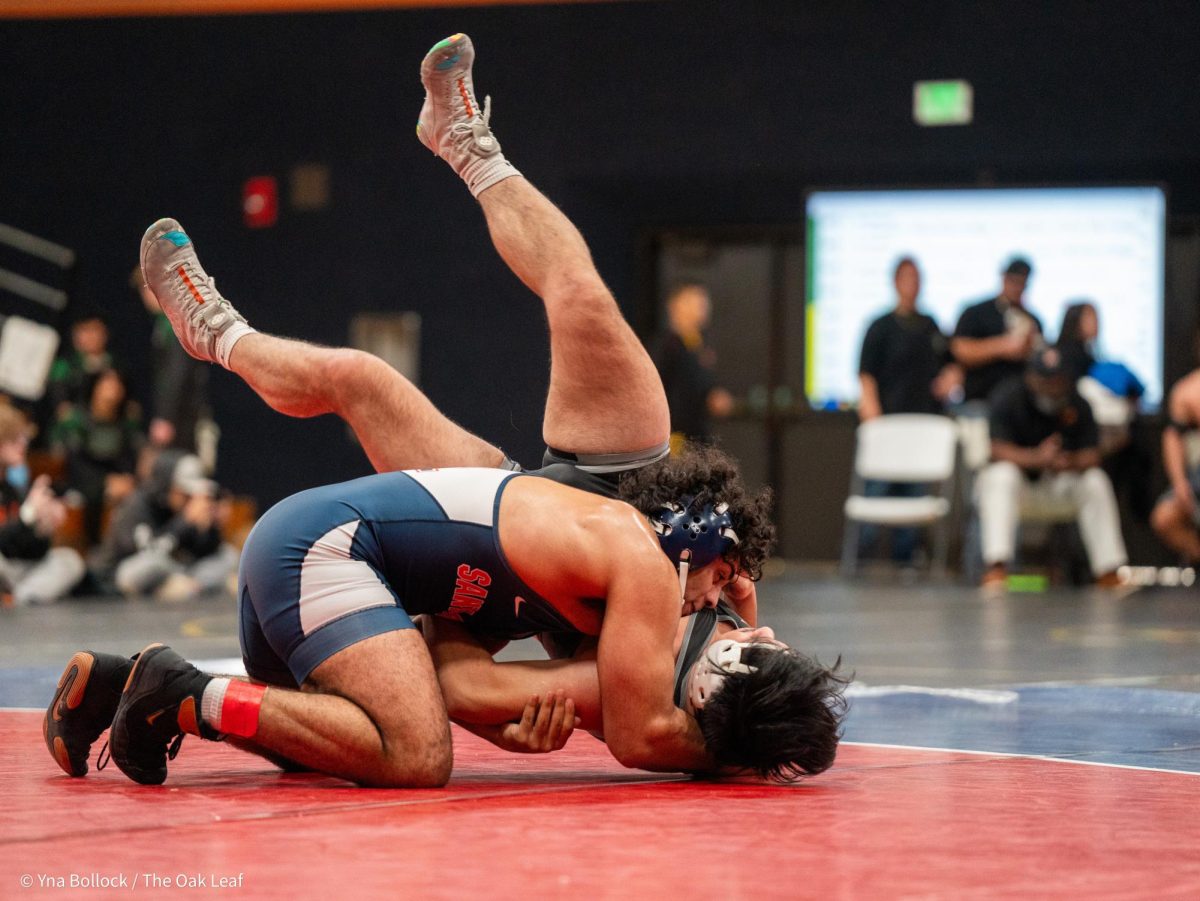 SRJC's Rayhan Jaleel (197) wins by fall over Modesto's Erick Lopez Alecio in the quarterfinals of the CCCAA Norcal Regional Championships in Haehl Pavilion on Saturday, Dec. 7.