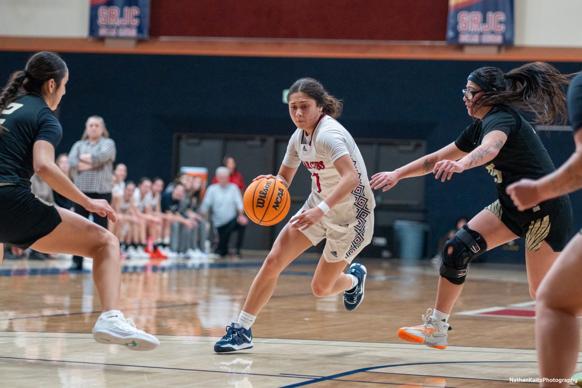 Santa Rosa’s guard Lindsey Arellano surges into the opposition paint against Butte at Haehl Pavilion on Tuesday, Dec. 10, 2024