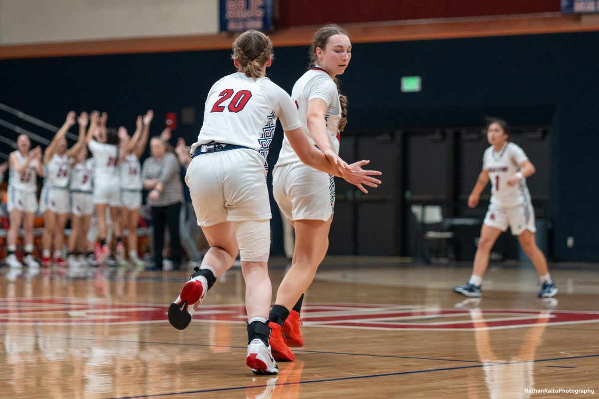 Bear Cubs’ guard Caitlin Baldwin runs back and celebrates with forward Sydney Martin against Butte at Haehl Pavilion on Tuesday, Dec. 10, 2024