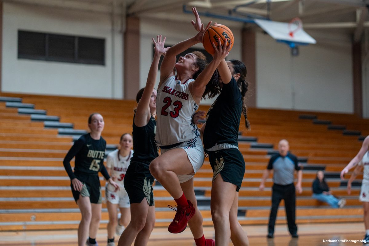 Santa Rosa’s guard/forward Ivy Gonzalez bursts past the defense to set up a layup against Butte at Haehl Pavilion on Tuesday, Dec. 10, 2024