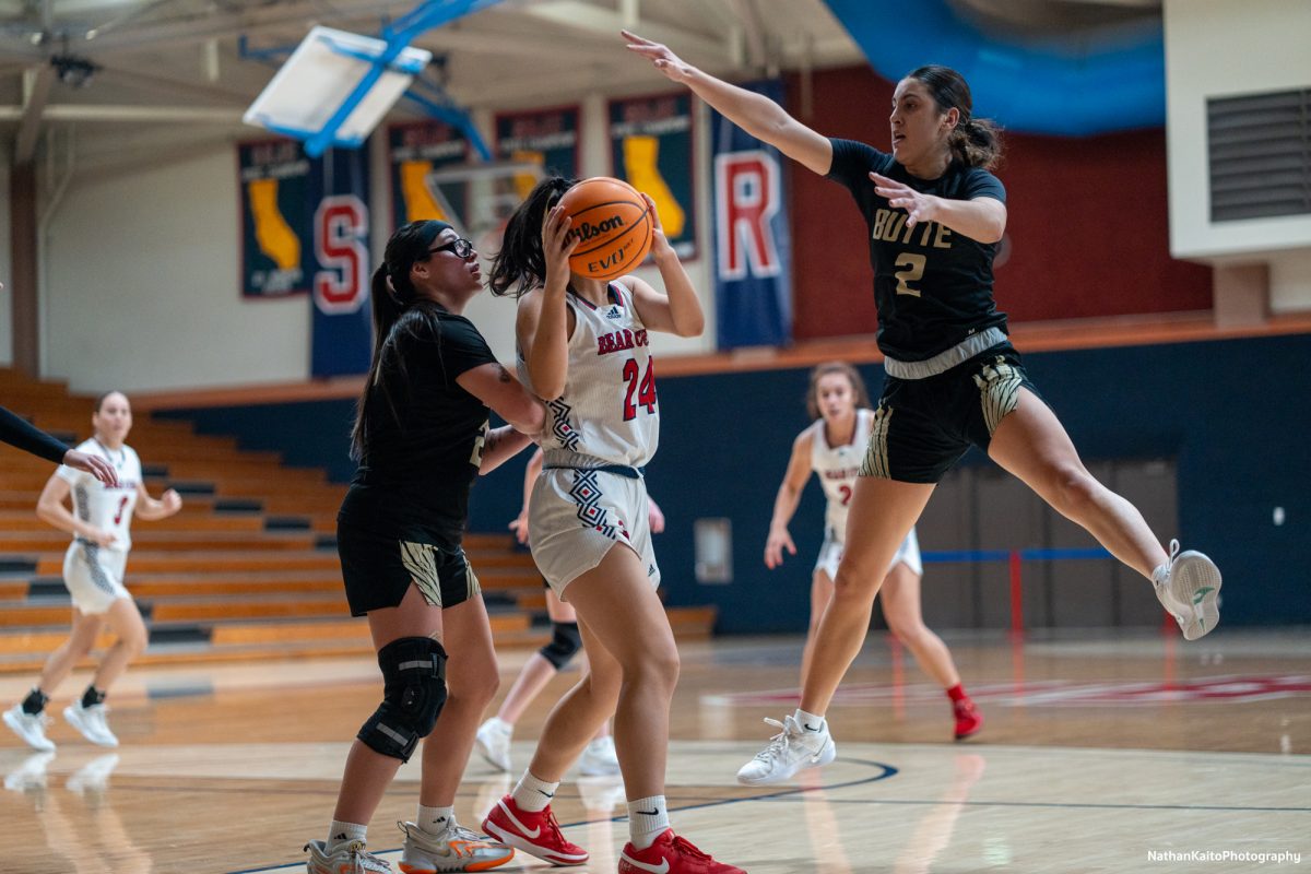 Santa Rosa’s forward Cece Solano fakes out her defender against Butte at Haehl Pavilion on Tuesday, Dec. 10, 2024