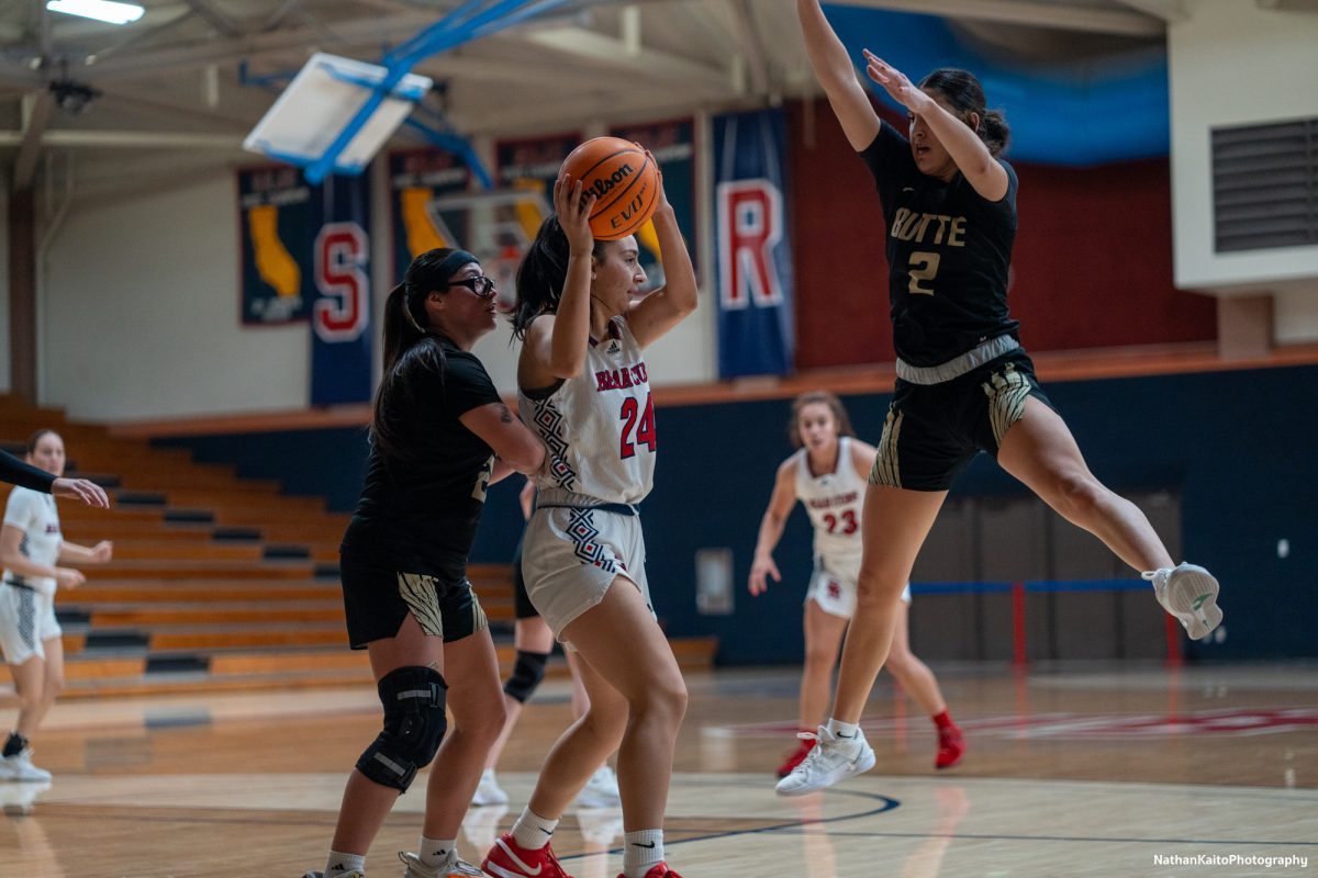 Bear Cubs’ forward Cece Solano holds up the ball while looking for options against Butte at Haehl Pavilion on Tuesday, Dec. 10, 2024