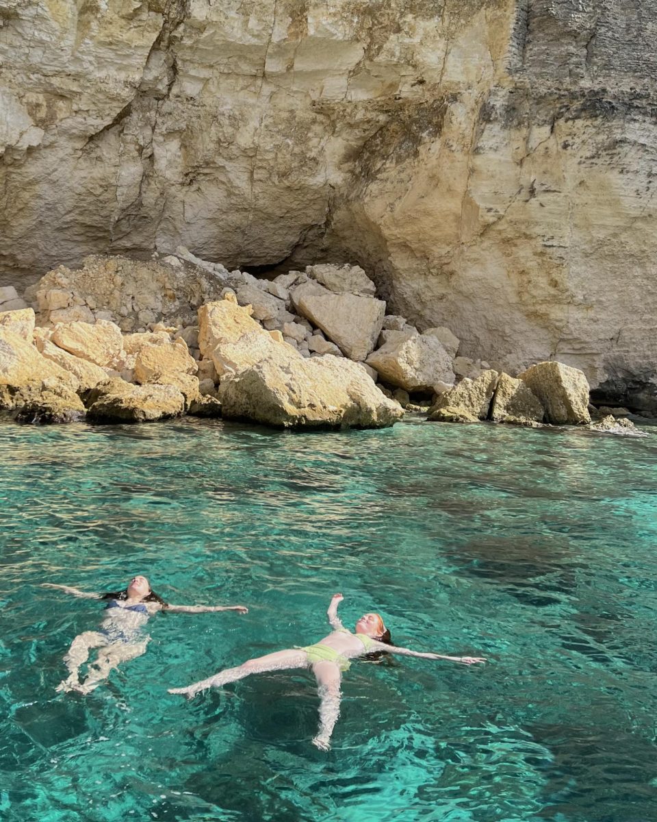 Study abroad students Ava Ellis and Ellie Hokerson-Brun swim in the Mediterranean sea off the coast of Malta, during mid semester break. 