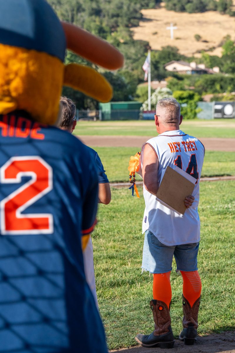 Sonoma Stompers on-field announcer Trey Dunia faces the flag during the national anthem at Arnold Field before the game against the Petaluma Leghorns on June 29, 2024.