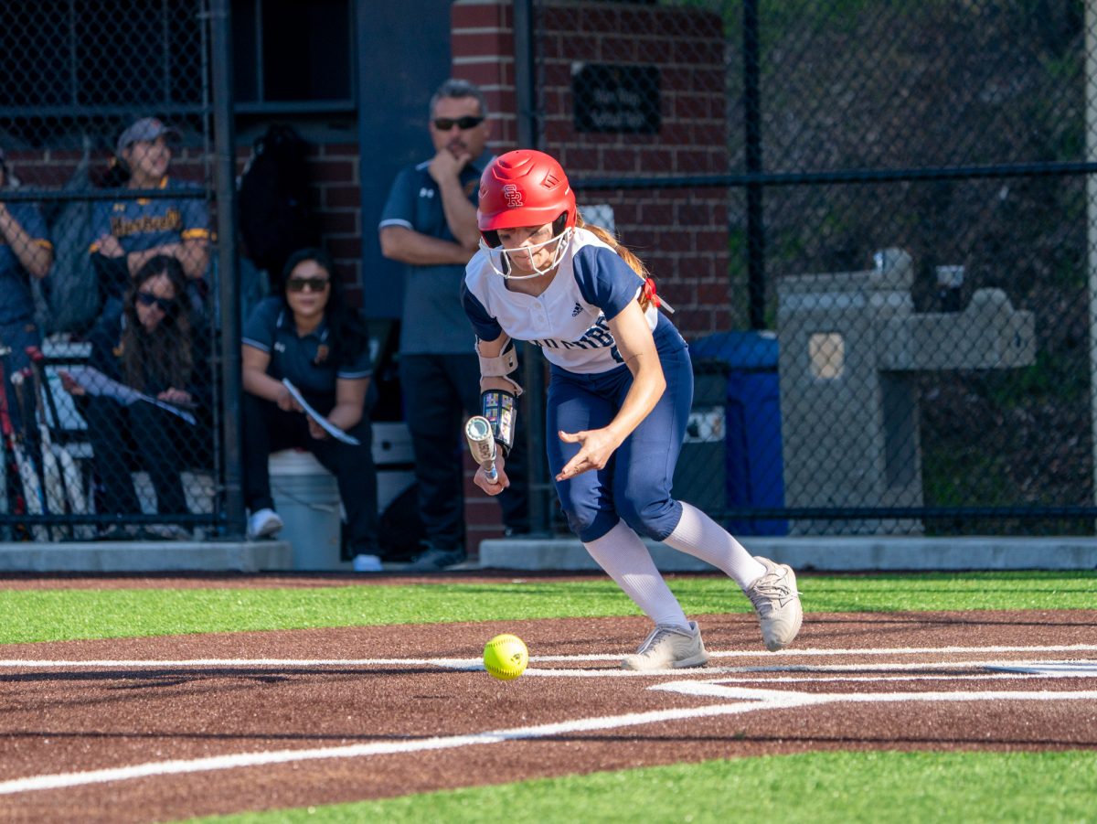 Sophomore Kali Garcia lays down a bunt for a single in the bottom of the second against Hartnell at home on Friday, Jan. 24, 2025.