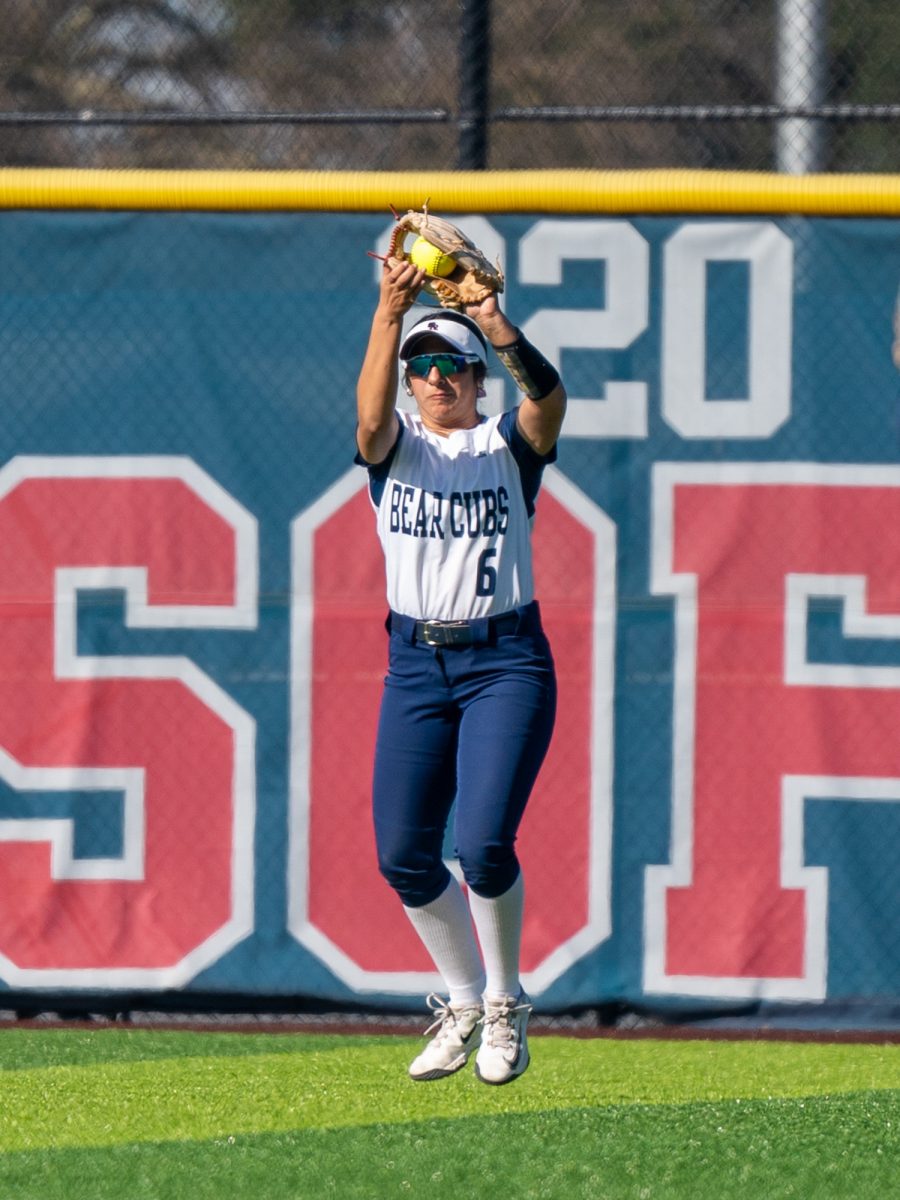 Outfielder Mira Olvera catches a fly out to center field at the top of the sixth in game one against Hartnell at home on Friday, Jan. 24, 2025.