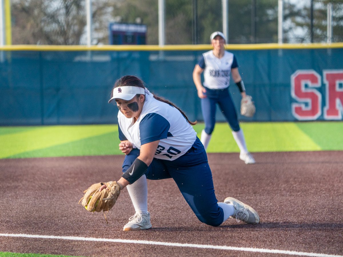 Sophmore third baseman Gabby Schenone catches a grounder to third base at the top of the third in the second game against Hartnell at home on Friday, Jan. 24, 2025.