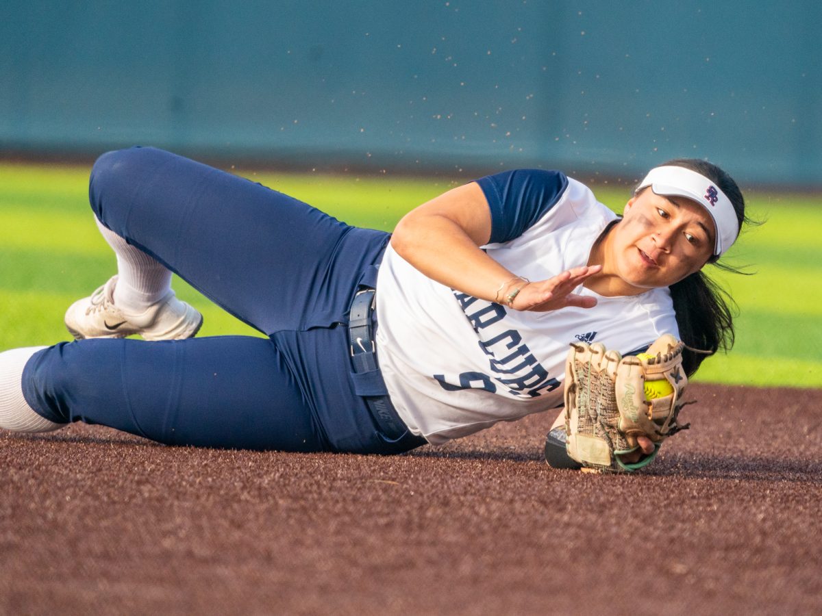 Freshman Ninu Elisara makes a diving catch in the second game against Hartnell at home on Friday, Jan. 24, 2025.