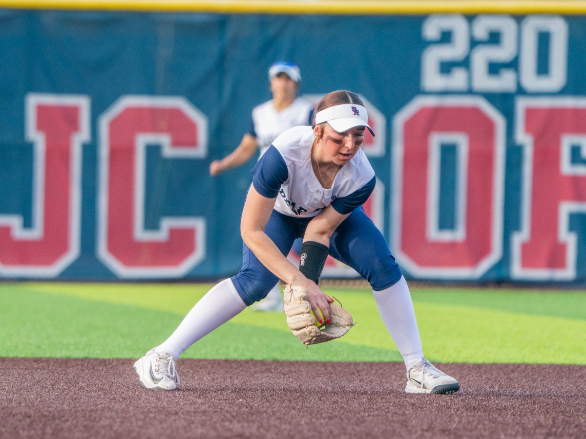 Freshman Kylee Bauman catches a grounder to shortstop at the top of the fourth in the second game against Hartnell at home on Friday, Jan. 24, 2025.