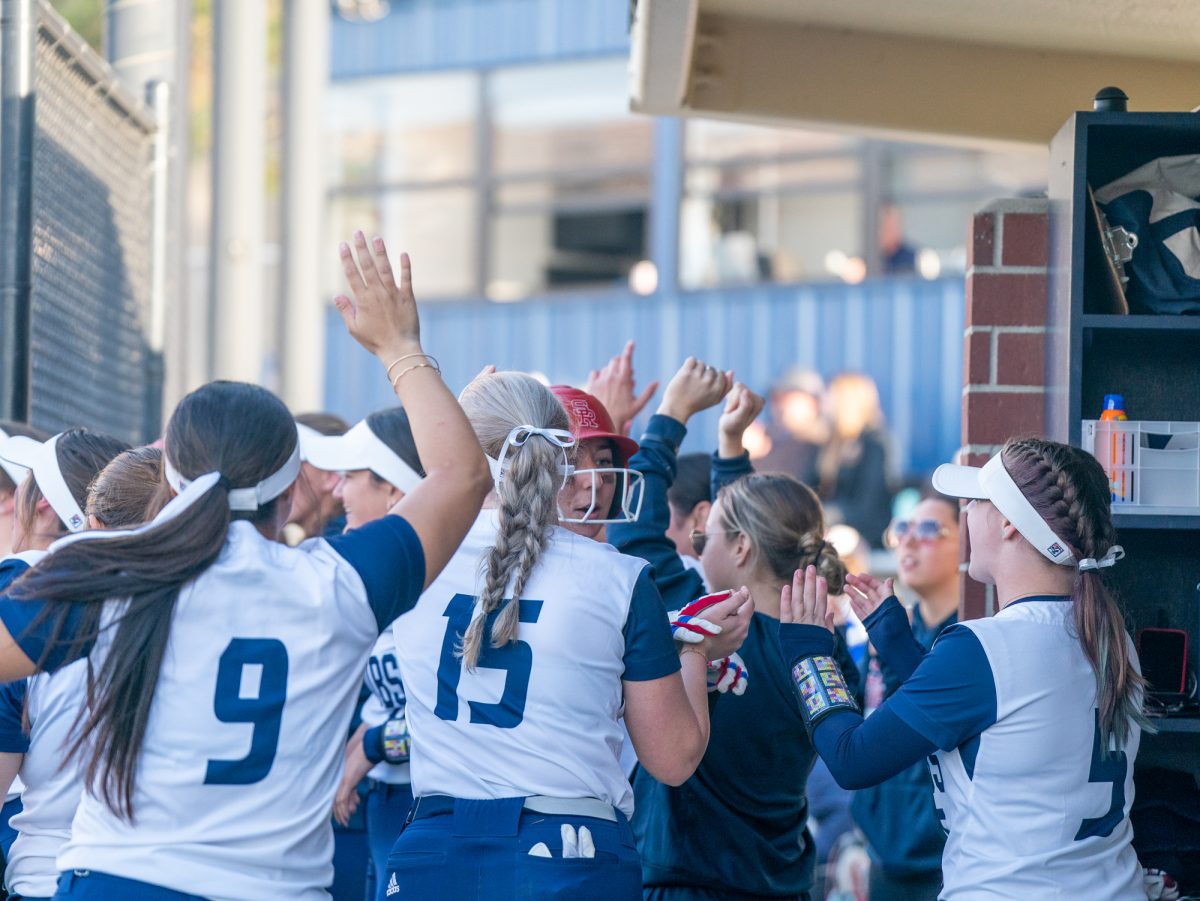 Kylee Bauman walks back to the dugout after coming home in the bottom of the sixth in the second game against Hartnell at home on Friday, Jan. 24, 2025.