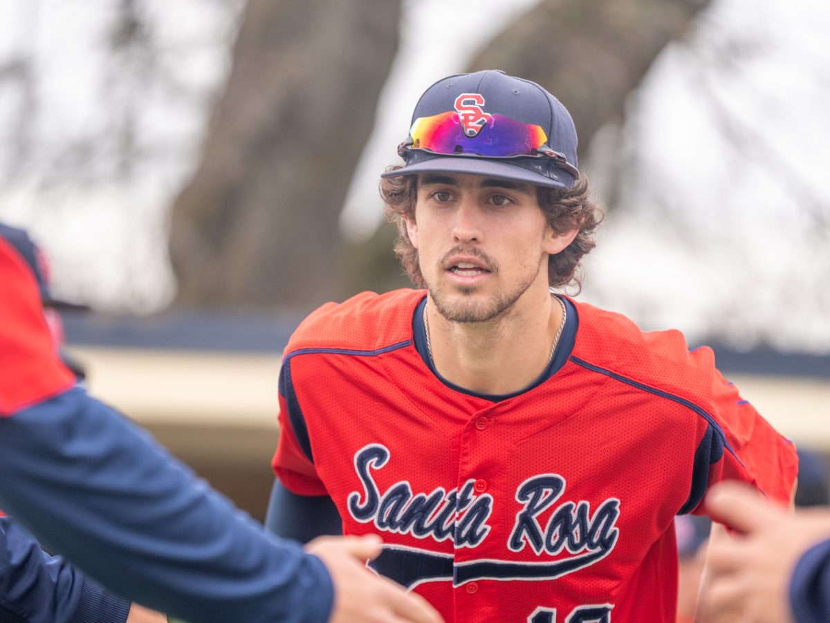 Bear Cubs center fielder Cooper Wood jogs out to his position ahead of the game against Los Medanos at home on Wednesday, Jan. 29, 2025.