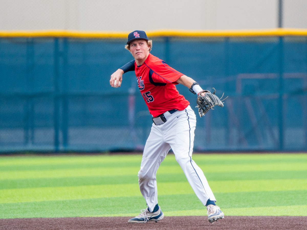 Bear Cub Brett Neidlinger winds back to send a ground ball from shortstop to first base in the top of the second against Los Medanos at home on Wednesday, Jan. 29, 2025.