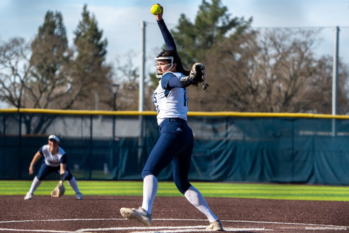 The Bear Cubs’ pitcher Mia Avila prepares to launch the ball at a Hartnell batter at Marv Mayes Softball Field on Friday, Jan. 24th, 2025