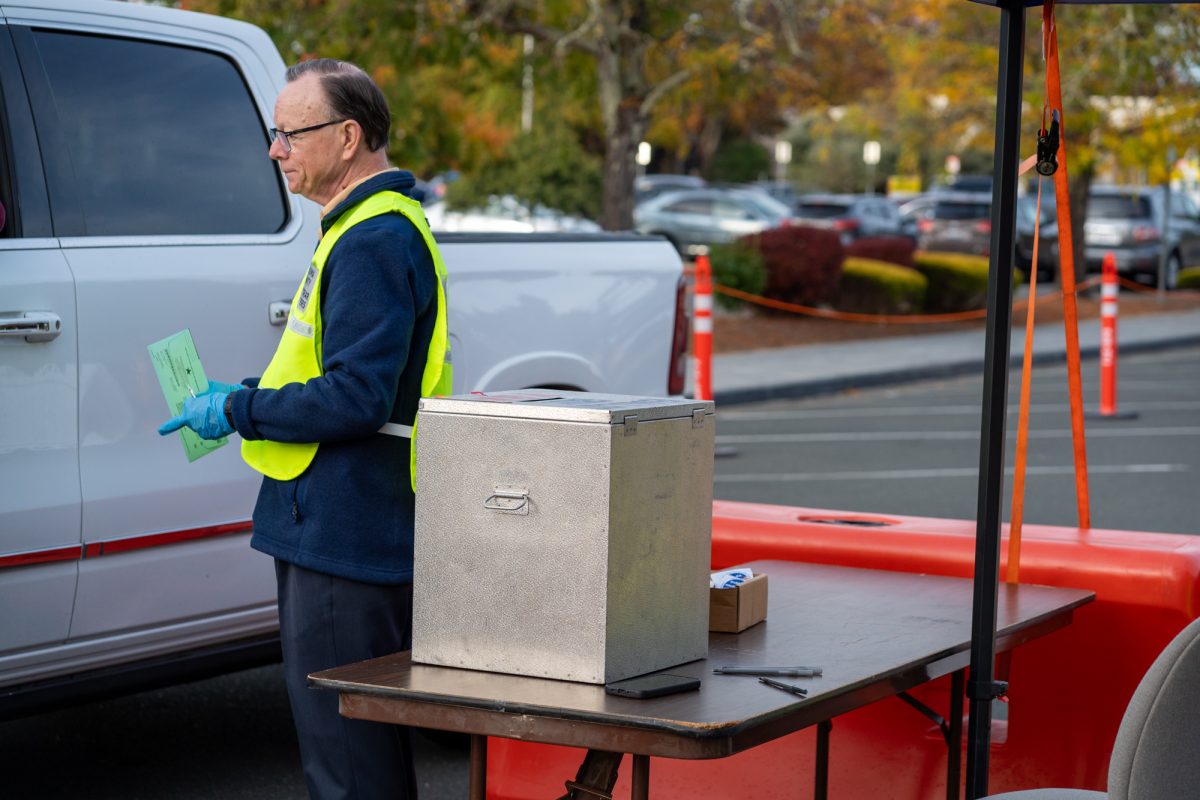 Ballots are collected via drive-through and deposited into a locked safety box at the Registrar of Voters in Santa Rosa on Tuesday, Nov. 5th, 2024.