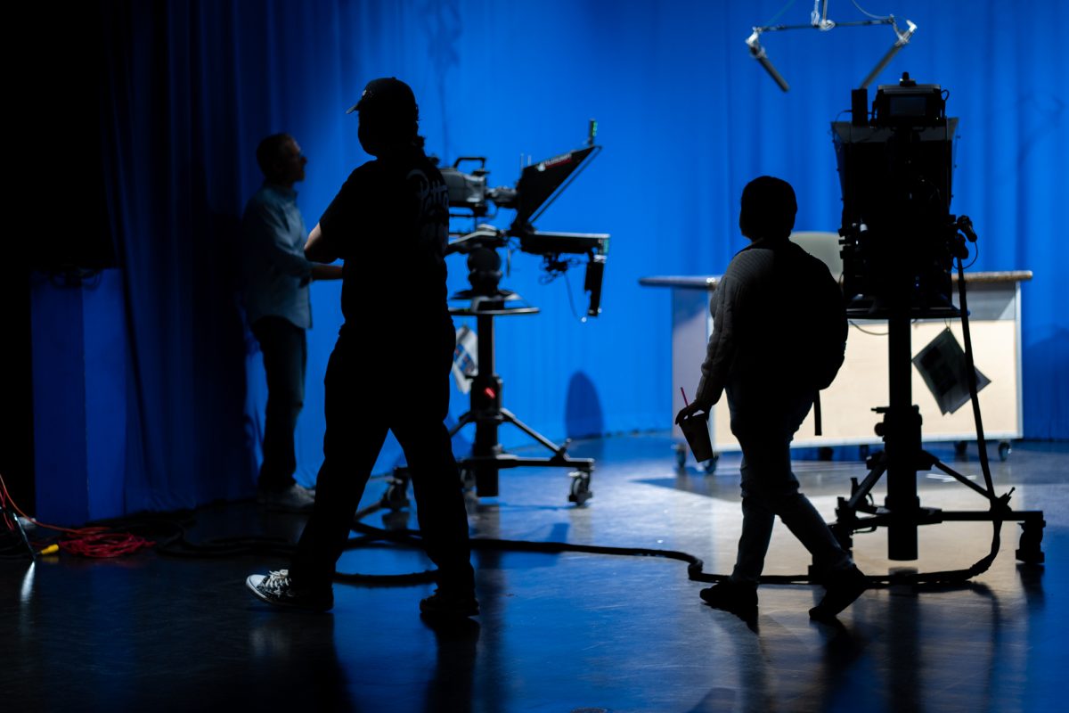 Student crew members prepare for the Oak Leaf Election Day broadcast in the studio in Frank P. Doyle Library on Tuesday, Nov. 5, 2024.