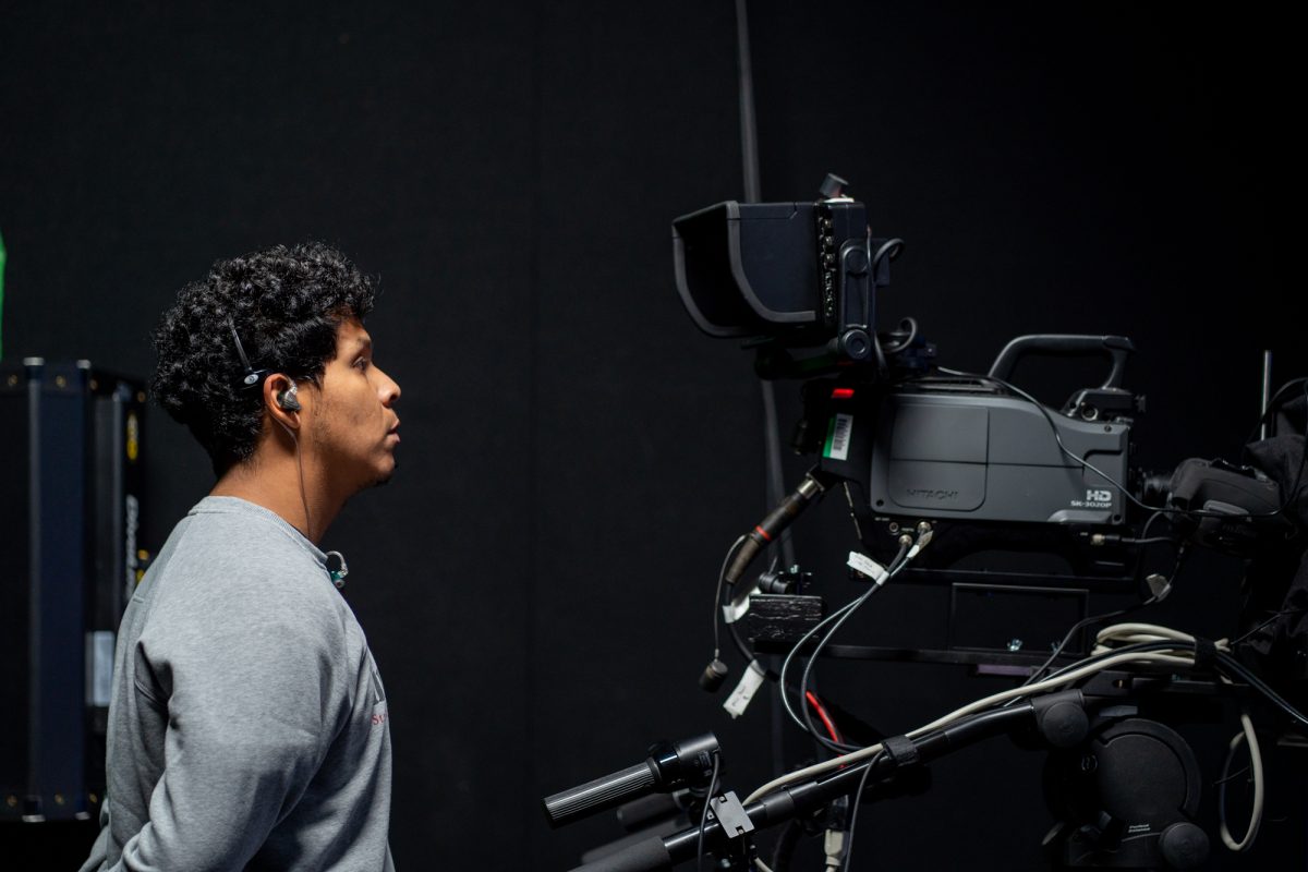 Student staff mans the camera for The Oak Leaf election day coverage live stream in the studio in Frank P. Doyle Library on Tuesday, Nov. 5th, 2024.