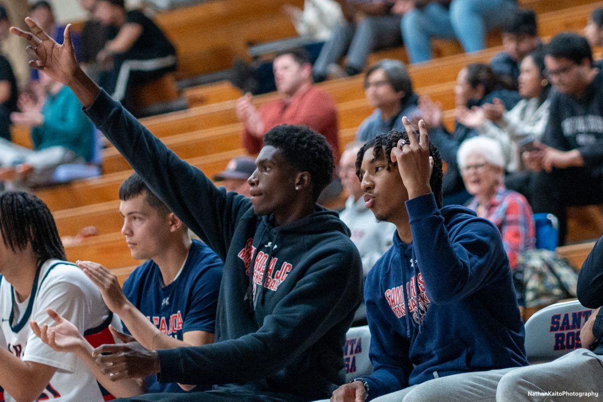 Santa Rosa’s bench reacts to back-to-back three-pointers from guard, Yanik Anderson as the Bear Cubs try to establish a lead against Sac City at Haehl Pavilion on Tuesday, Jan. 14, 2025.